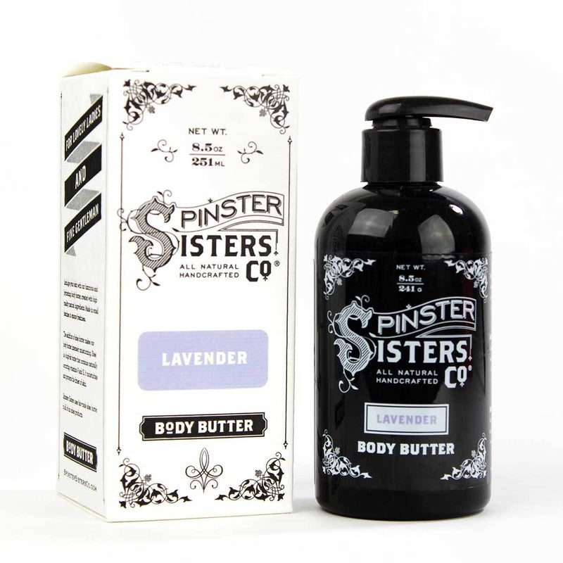 A black pump bottle labeled "Spinster Sisters, Co. Lavender Body Butter" next to its packaging box, both featuring ornate black and white designs.
