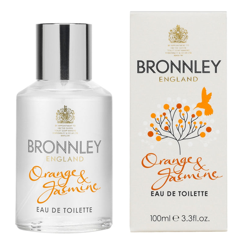 A bottle of Bronnley English Soaps Orange & Jasmine Eau Fraiche next to its packaging box, both featuring elegant white and orange designs.