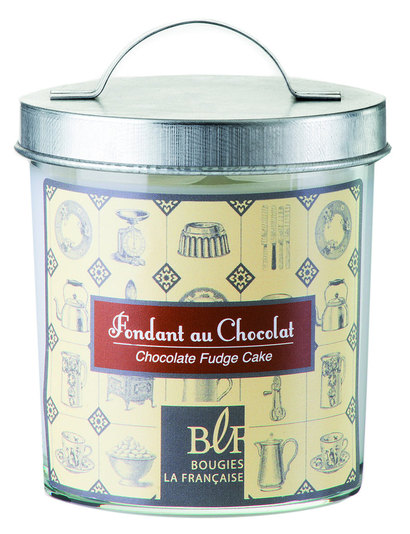 Image of a decorative metal tin with a handle on top, labeled "fondant au chocolat, chocolate fudge cake" in French and English, featuring ornate designs and kitchen-themed illustrations including Bougies la Francaise Chocolate Fudge Cake Candle w/Galvanized Lid.
