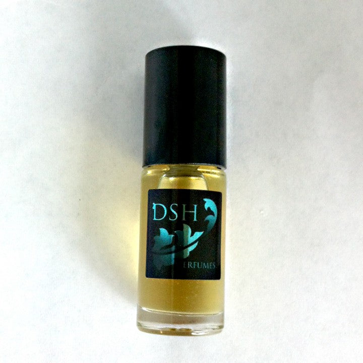 A small glass bottle of DSH perfume essence - maui with a black cap, labeled "Dawn Spencer Hurwitz Perfumer," on a plain white background. The perfume liquid inside, infused with Maui coconut fragrance, appears yellow.