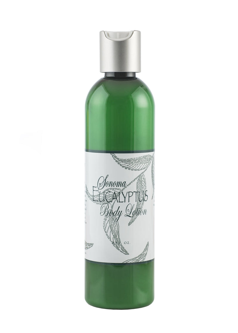 A green translucent bottle with a silver cap labeled "Sonoma Lavender Eucalyptus Body Lotion" featuring elegantly designed eucalyptus leaves and text on the label.