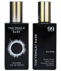 Two bottles of Margot Elena's TokyoMilk Dark Eclipse No. 99 Eau de Parfum, labeled "eclipse". One bottle notes ingredients like black anise, smoked amber, mint leaf, and gardenia. Each has a distinctive black and