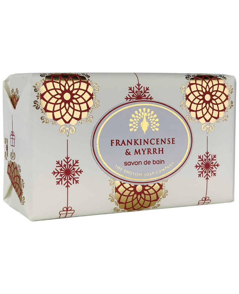 A rectangular bar of The English Soap Co. Frankincense & Myrrh Festive Italian Wrapped Soap packaged in a box with intricate red and gold mandala designs. The label reads “Frankincense & Myrrh” by the English Soap Company.