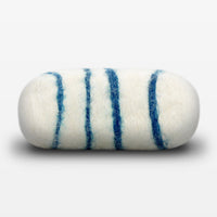 A "Fiat Luxe - Classic Bay Rum Felted Soap" with three blue vertical stripes, isolated on a white background.