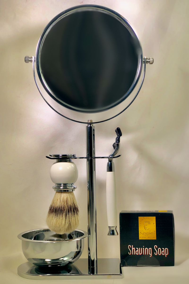 A Kingsley Shave Set with Mirror with a round, tiltable mirror, a Kingsley Natural Bristle Shave Brush, a Gillette Mach III Razor, a metal bowl, and a box of shaving soap displayed on