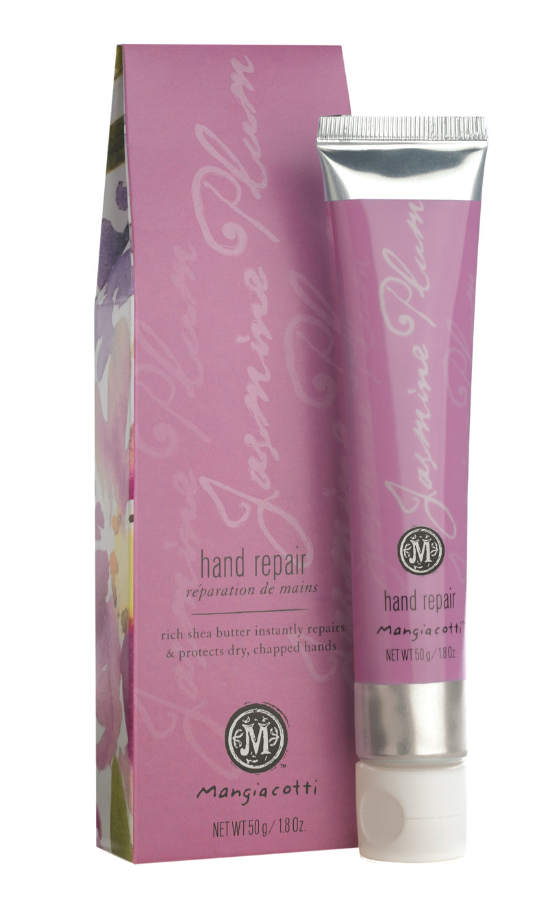 A pink tube labeled "Mangiacotti Jasmine Plum Hand Repair" with rich shea butter and soothing chamomile extract, alongside its matching pink box with floral accents. The packaging indicates it is for repairing and.