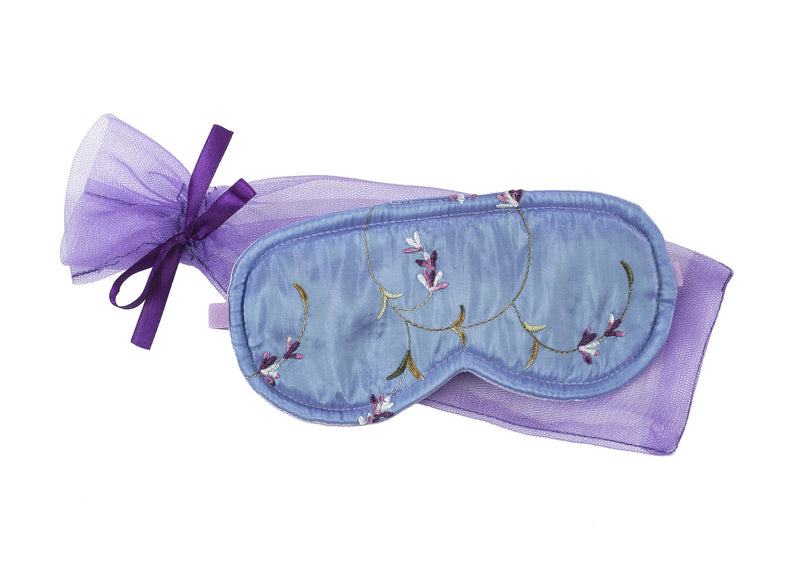 A Sonoma Lavender Sleep Mask - Embroidered Lavender adorned with delicate floral embroidery and a sheer purple ribbon, infused with a calming lavender scent, isolated on a white background.