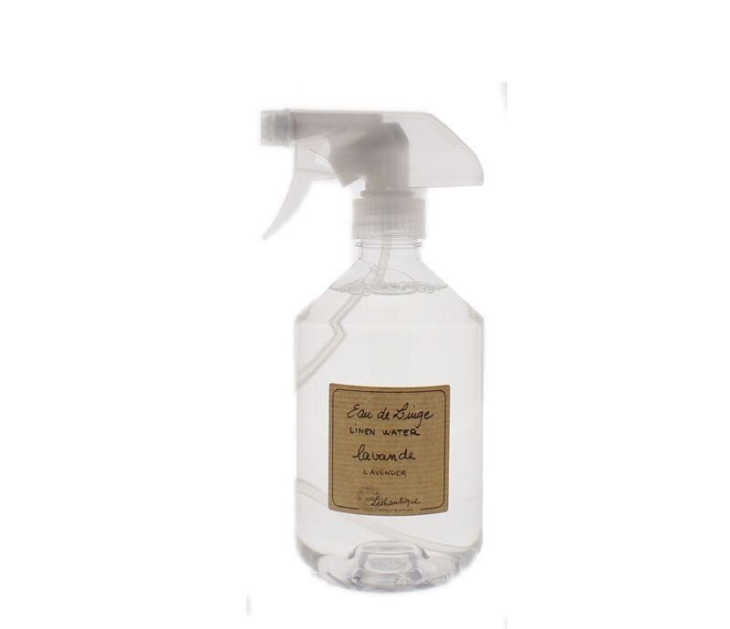 A transparent spray bottle with a label that reads "Lothantique Lavender Linen Water, fragrant water, lavender" on a white background.