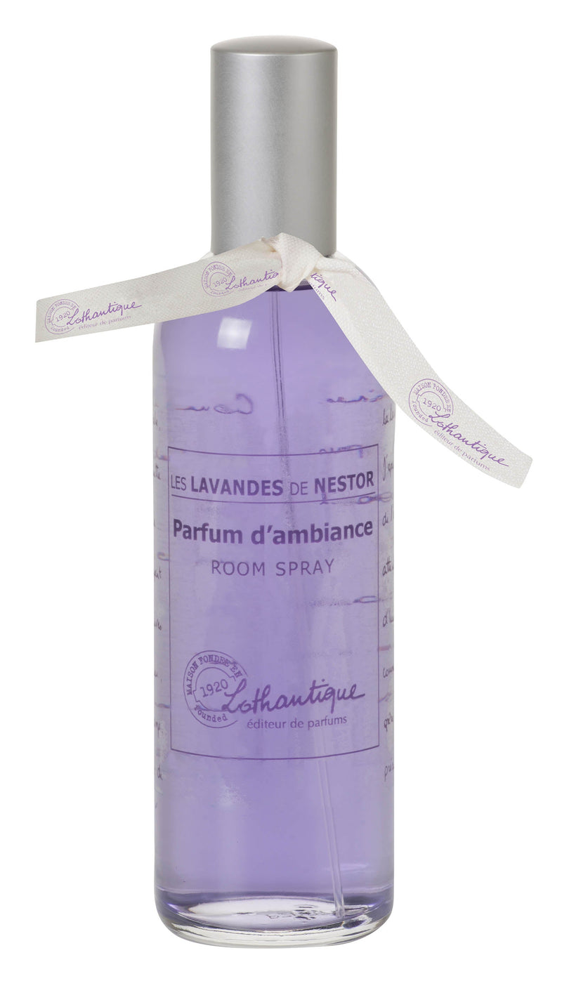A bottle of Lothantique les lavandes de l'oncle Nestor lavender room spray. The bottle features elegant script and a ribbon, labeled with "1920 Authentique Créateur de Par".