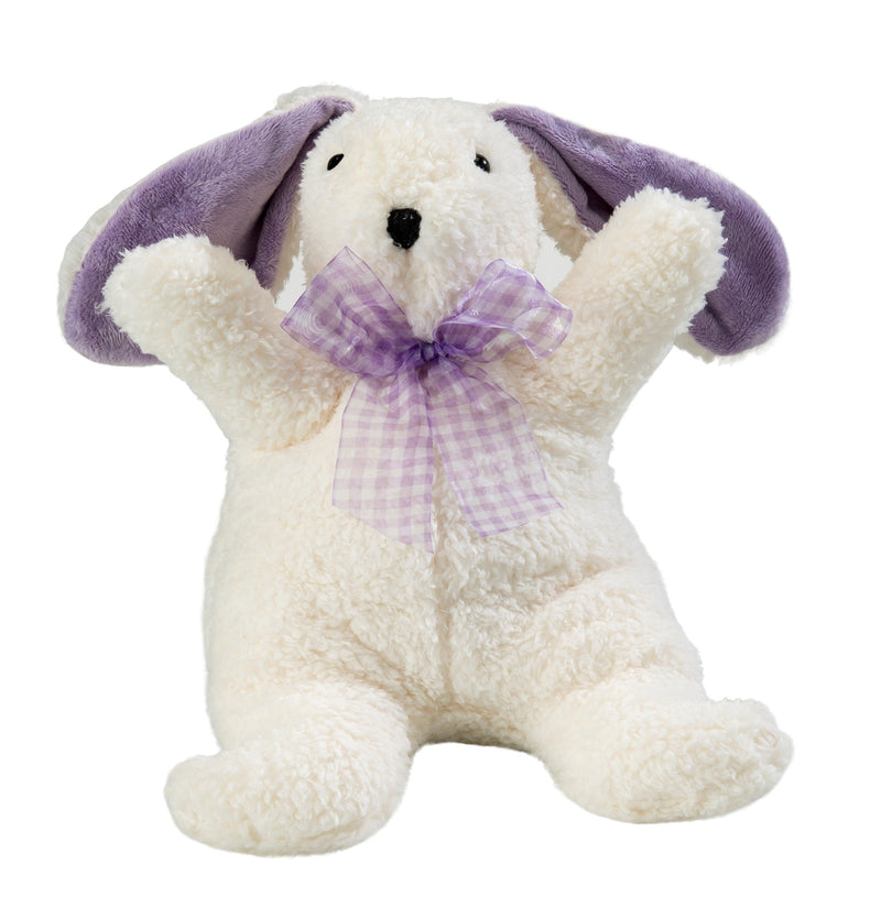 A plush toy rabbit with white fur and purple ears, sitting upright. It features Sonoma Lavender "Lil", the lavender bunny rabbit and a purple and white checkered bow tie around its neck.