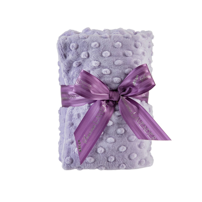 A folded Sonoma Lavender - Lavender Dot Heat Wrap tied with a matching satin ribbon bow, featuring the word "lavender" printed along its length and infused with lavender aromatherapy, isolated on a white background.