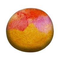 A Fiat Luxe - Classic Lemon Zest felted soap with a blend of yellow, orange, pink, and red hues, isolated on a white background.
