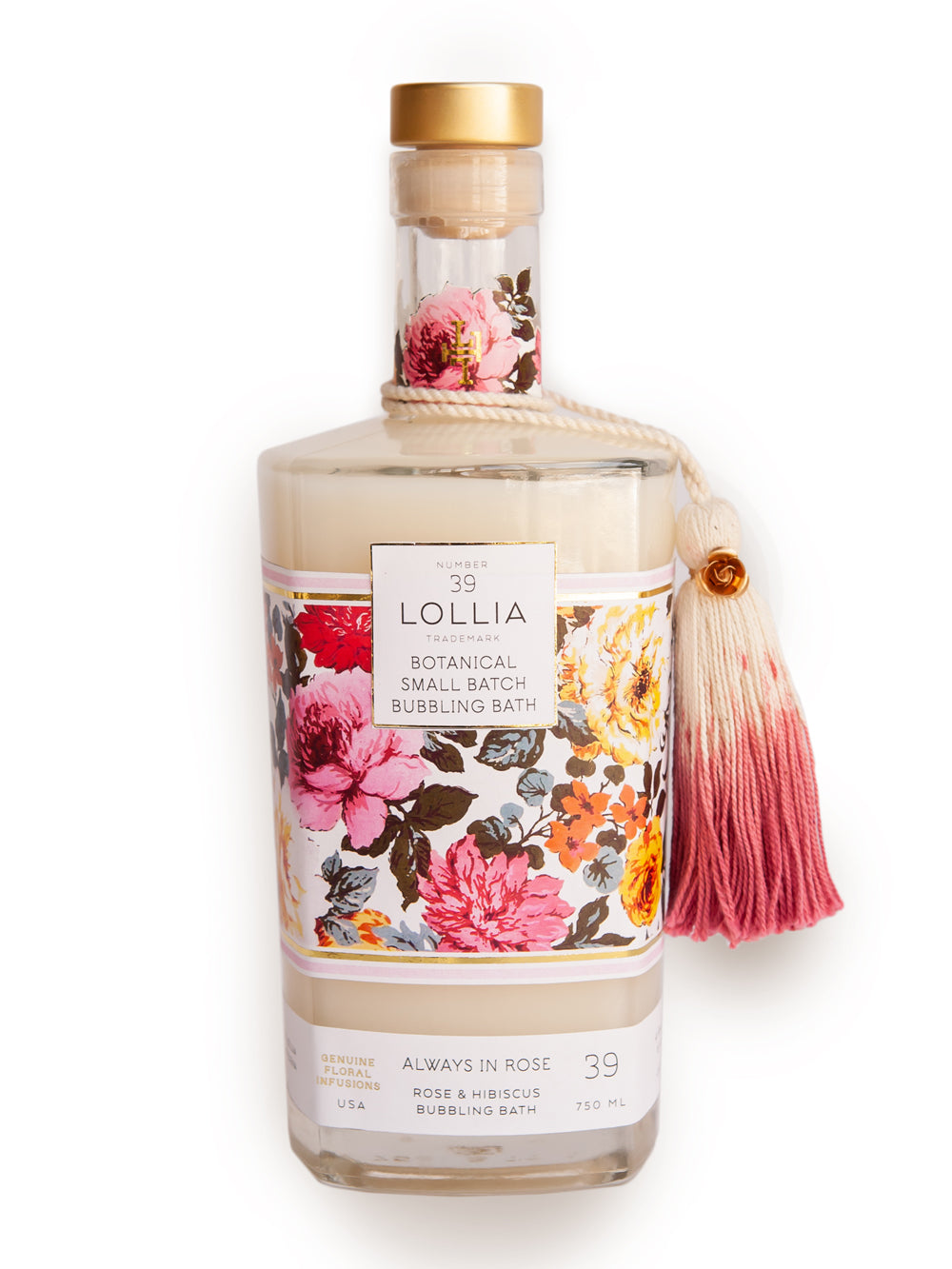 A bottle of Margot Elena's Lollia Always in Rose Bubble Bath, labeled "always in rose," decorated with colorful floral designs and topped with a pink tasseled cap.