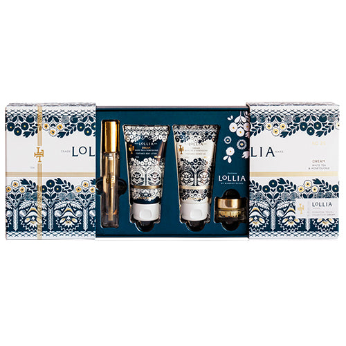 A Margot Elena branded Lollia Dream Travel Gift Set featuring ornately designed packaging in blue and white. The set includes two tubes of hand cream, a small bottle of Dream Eau de Parfum.