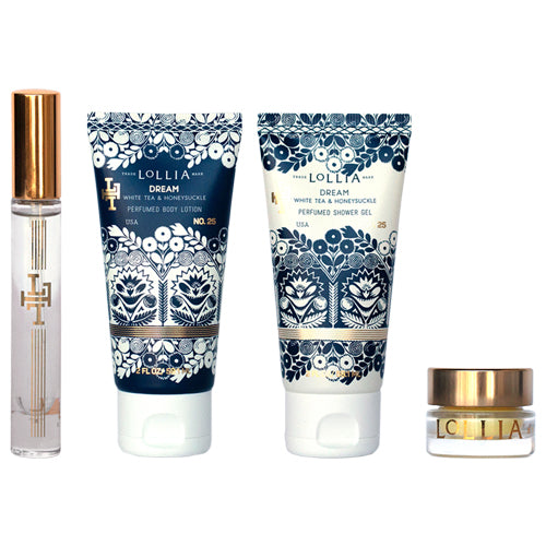 A collection of Margot Elena branded Lollia Dream Travel Gift Sets, including a Dream Eau de Parfum, body lotion, shower gel, and a small cream jar, all decorated with intricate blue and white designs.