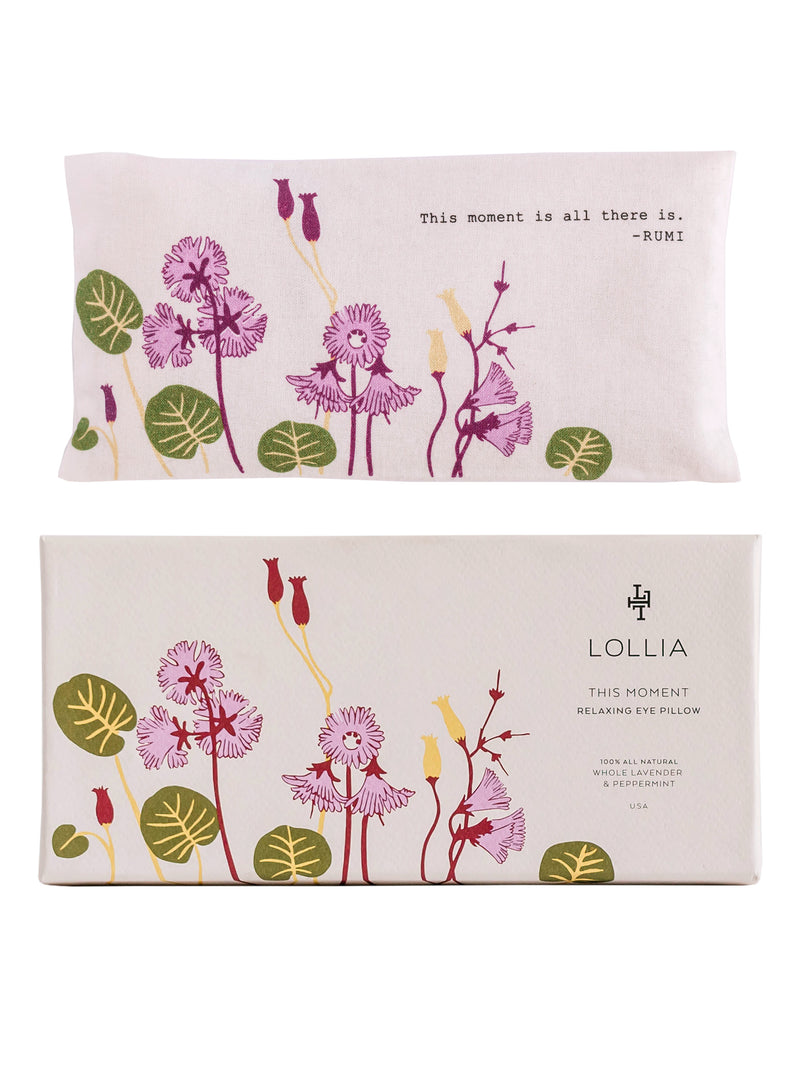 Two images of a Lollia This Moment Lavender Herb Eye Pillow by Margot Elena with a floral pattern and a quote from Rumi saying "This moment is all there is." The second image shows the pillow packaging.