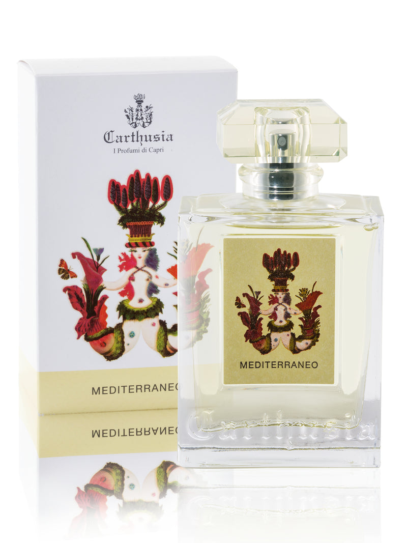 A bottle of Carthusia Mediterraneo Eau de Parfum by Carthusia I Profumi de Capri with a detailed label and cap, featuring a hint of Sicilian lemon, accompanied by its box with a floral design, against a white background.