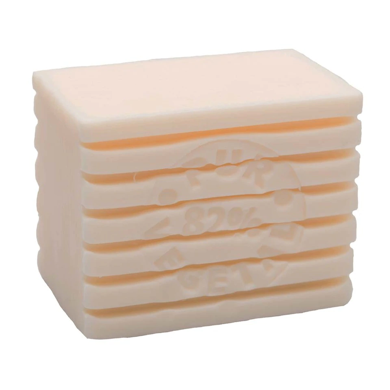 A stack of six rectangular bars of La Savonnerie de Nyons Striped Soap -Milk 300gm, each embossed with a logo and "82% gelly" written on them, isolated on a white background.