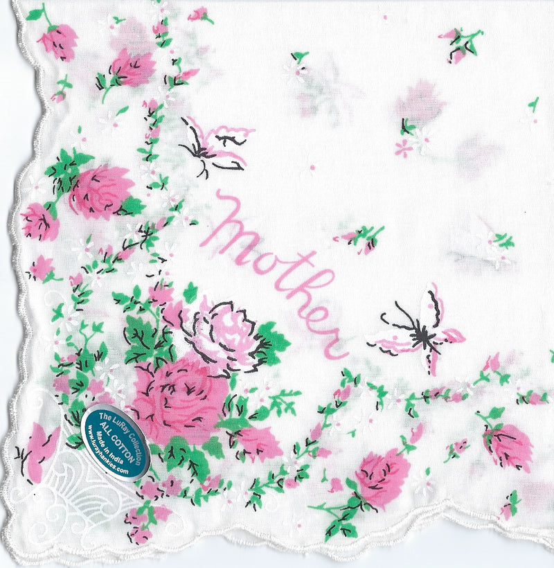 A Vintage-Inspired Hanky - Mother with Roses & Butterflies by Hankies ala Carte features a floral pattern of pink roses and green leaves, along with the word "mother" in cursive light pink script and a lace border.
