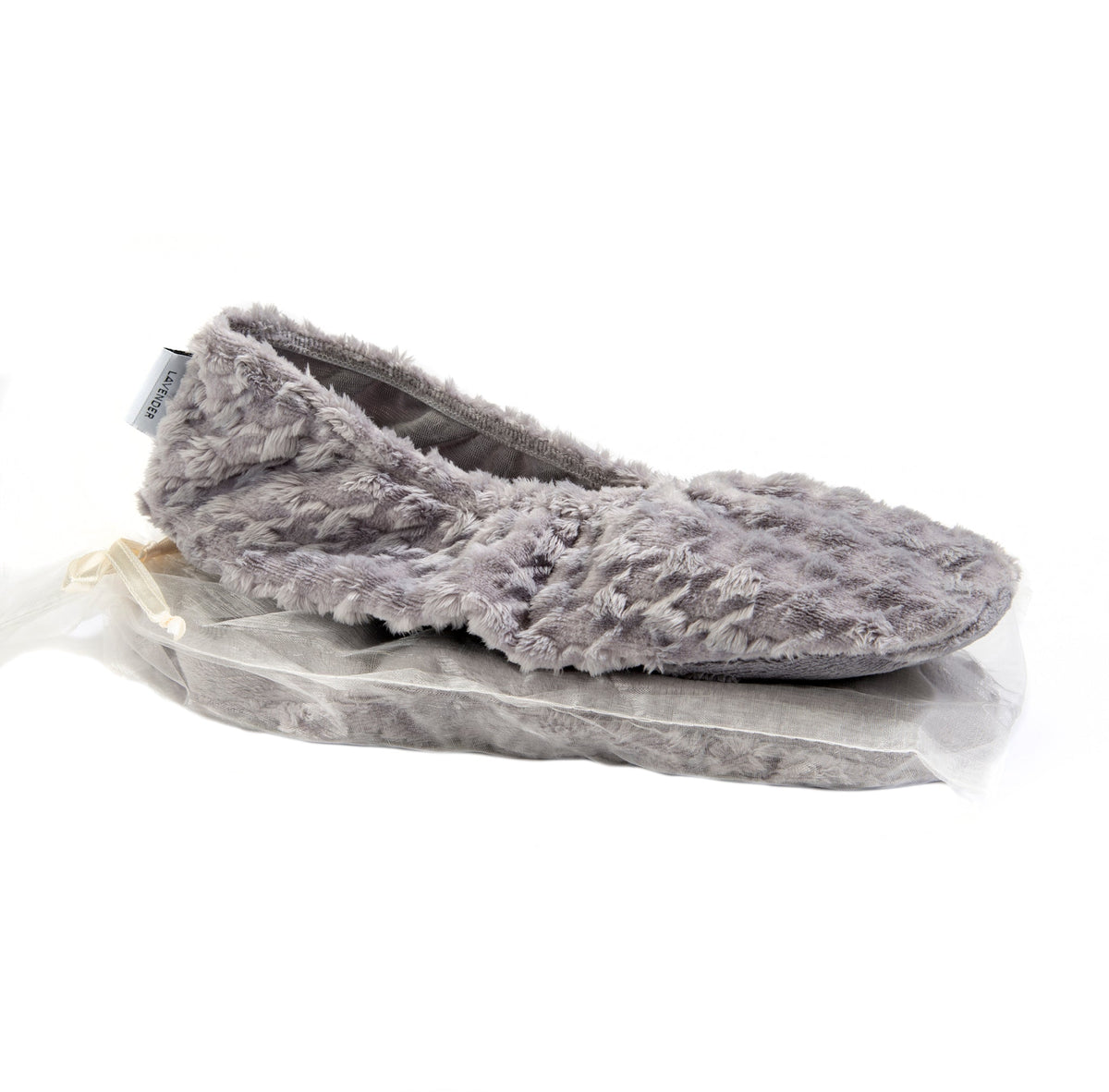 A plush, grey Sonoma Lavender Silver Houndstooth heated footies slipper with a fluffy texture, displayed on a white background, still wrapped partially in transparent plastic packaging.