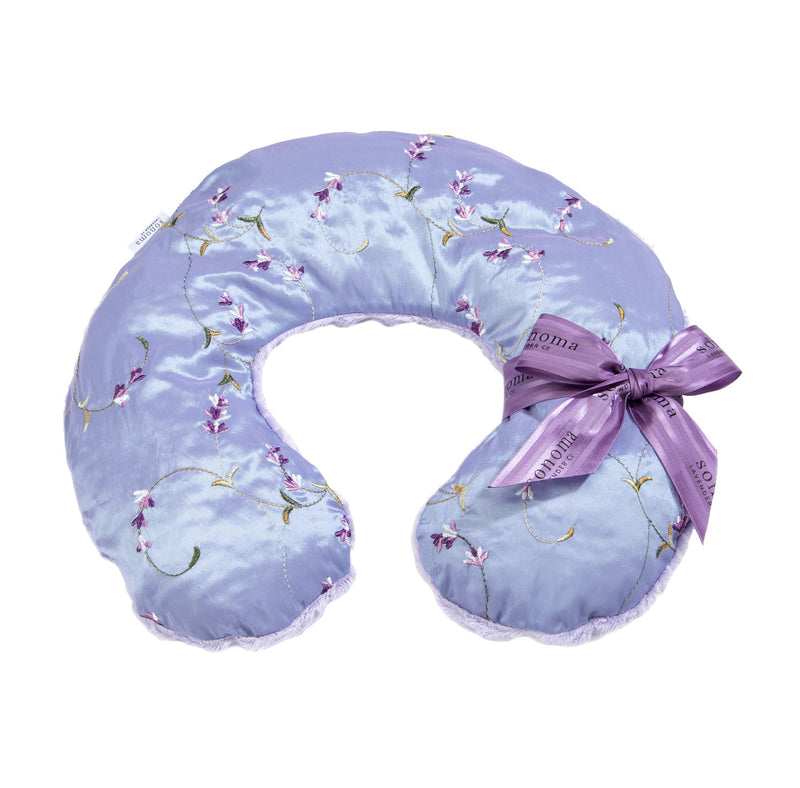 The Sonoma Lavender Embroidered Lavender Neck Pillow by Sonoma Lavender is a satin microwavable neck wrap, adorned with purple flower and green vine embroidery plus a matching purple ribbon bow for an elegant touch.