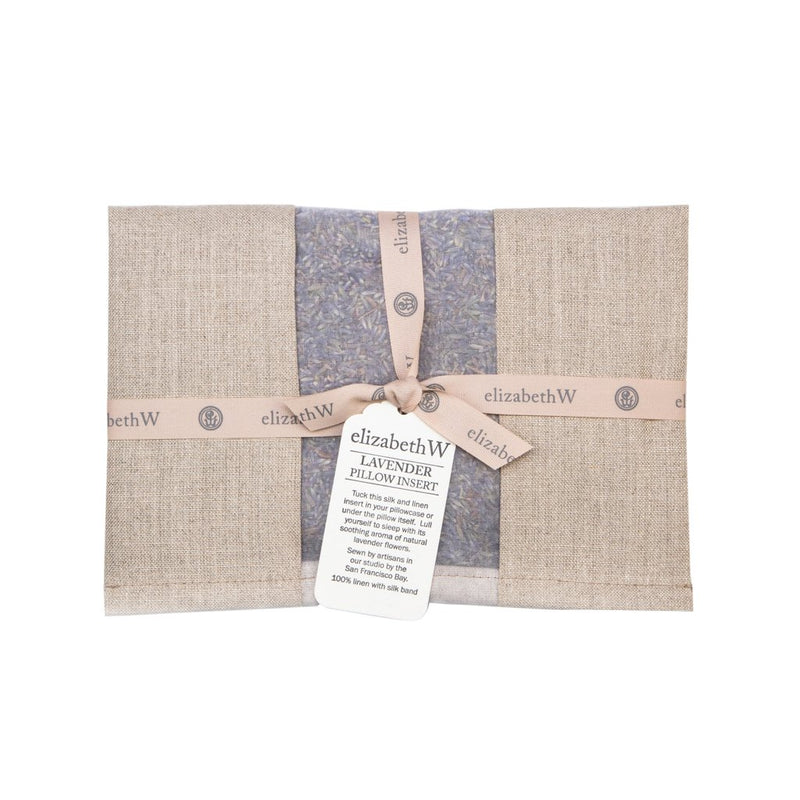 Linen sachet with a French lavender flower insert, tied with a beige ribbon labeled "elizabeth W." A tag attached provides product information about the aromatherapeutic sleep aid elizabeth W Lavender Pillow Insert - Natural.