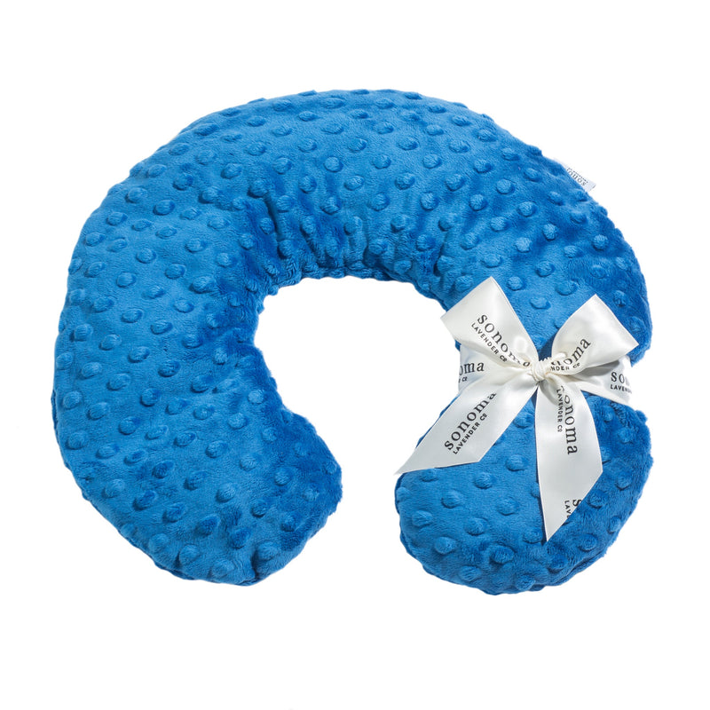 A vibrant blue, minky fabric Sonoma Lavender neck pillow with a textured bubble pattern and infused with OceanAire scent, tied with a decorative white ribbon printed with the word 'sonoma' in gray.