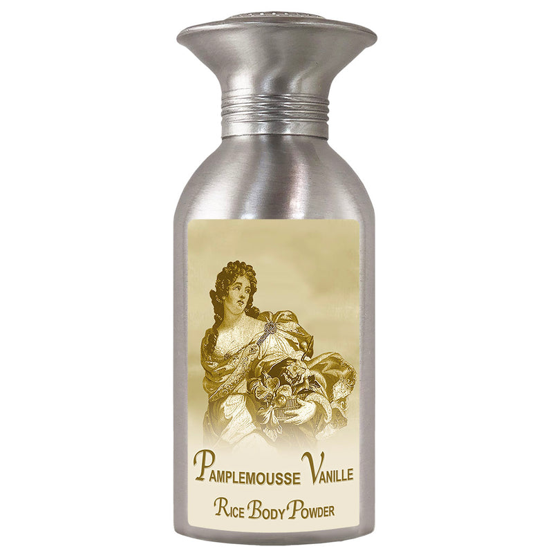An ornate container of La Bouquetiere Pamplemousse Vanille rice body powder labeled "pamplemousse vanille," featuring a classical-style illustration of a woman holding flowers.