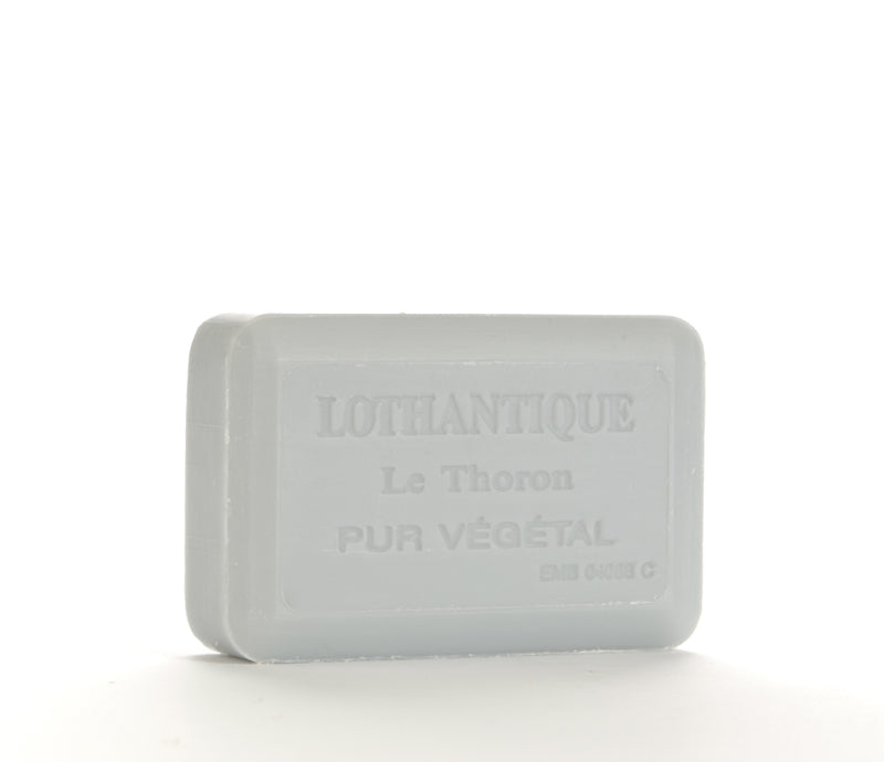 A single bar of gray Lothantique Lavender Shea Enriched Soap, centered on a plain white background.