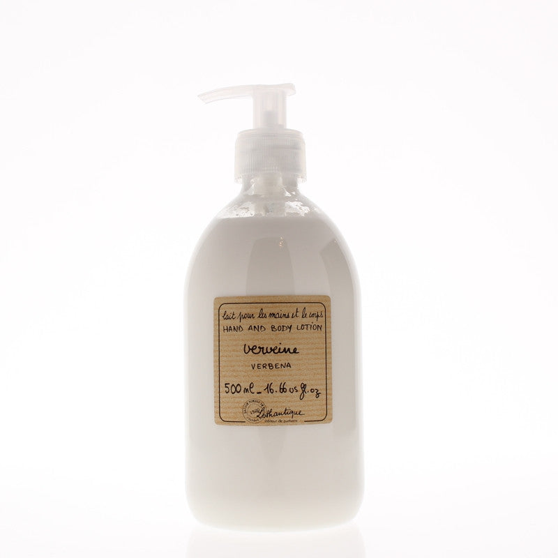 A bottle of Lothantique Verbena Body Lotion 500ml enriched with Vitamin E and sweet almond oil, featuring a pump dispenser, labeled "take your moment & treat yourself" against a white background.