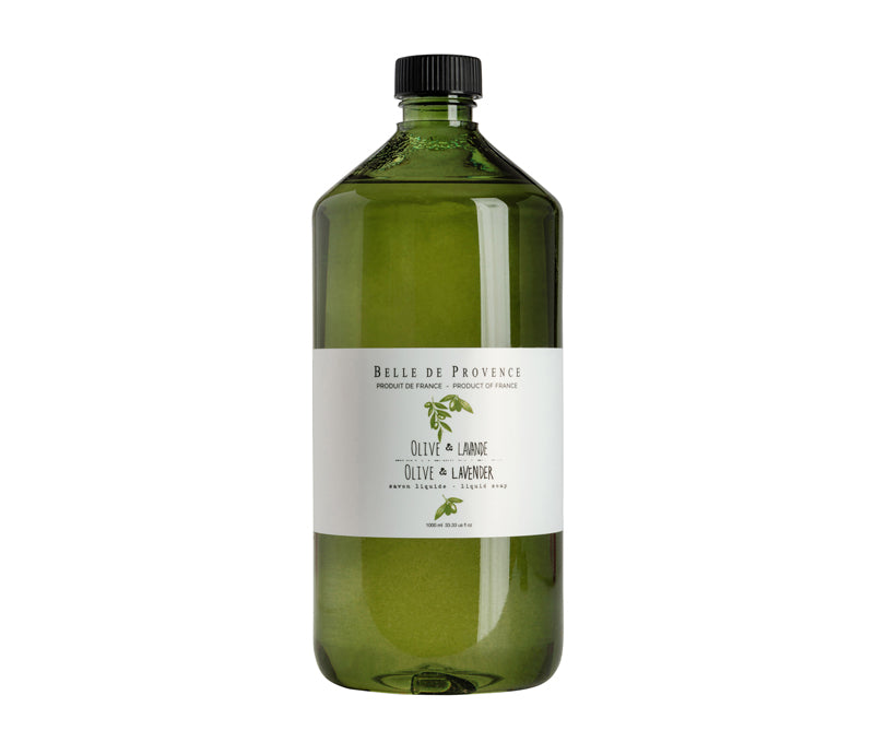 A large green glass bottle of Lothantique Belle de Provence olive and lavender liquid soap, isolated on a white background. The label is minimalistic in design.