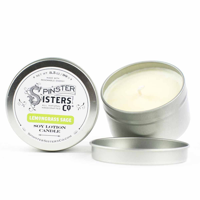 Two Spinster Sisters, Co. soy lotion candles in Lemongrass Sage, one with the lid open showing a white candle inside, against a white background. The scent lemongrass sage is labeled.