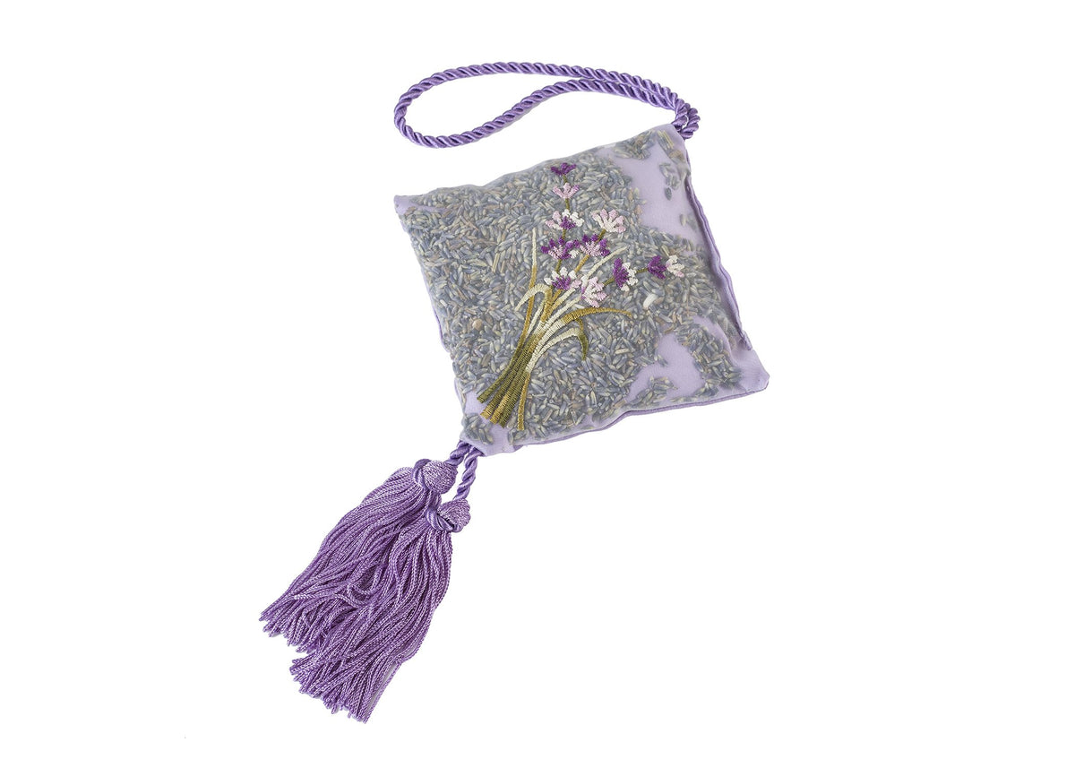 A small Sonoma Lavender 6" Lavender Hanging Sachet with Tassel with a fresh scent and a purple embroidered design featuring flowers and leaves, accompanied by a purple tassel and a braided handle, displayed on a white background.