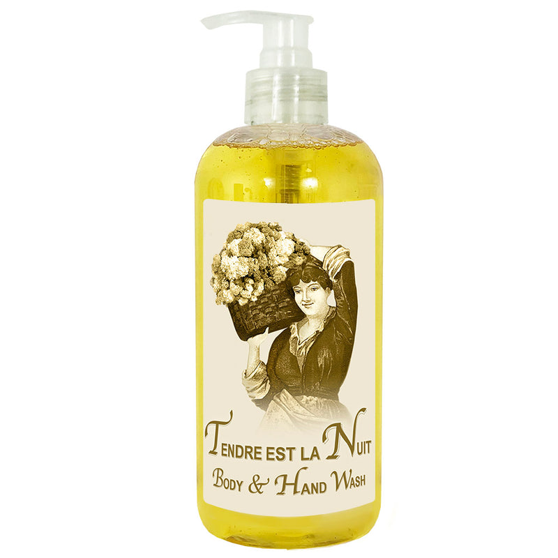 A transparent pump bottle of La Bouquetiere Tendre est la Nuit Hand & Body Wash featuring a vintage illustration of a woman holding a bouquet of flowers.