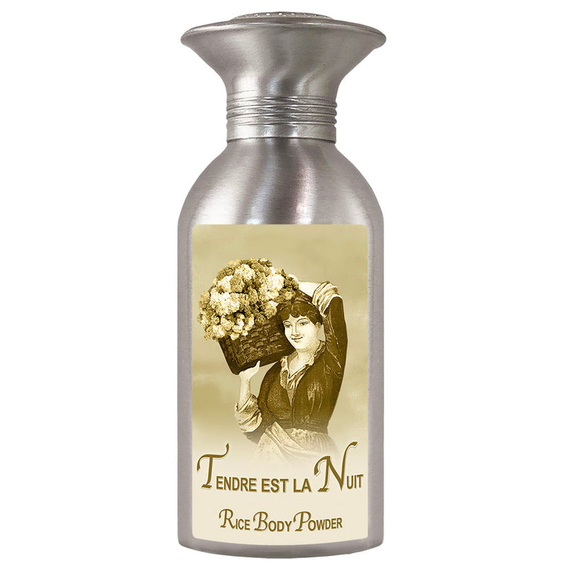 Vintage-themed La Bouquetiere Tendre est la Nuit Rice Powder bottle featuring an aged ivory label with an illustration of a smiling woman holding a basket of flowers. Label text includes "tendre est la nuit." Made with rice and corn flour.