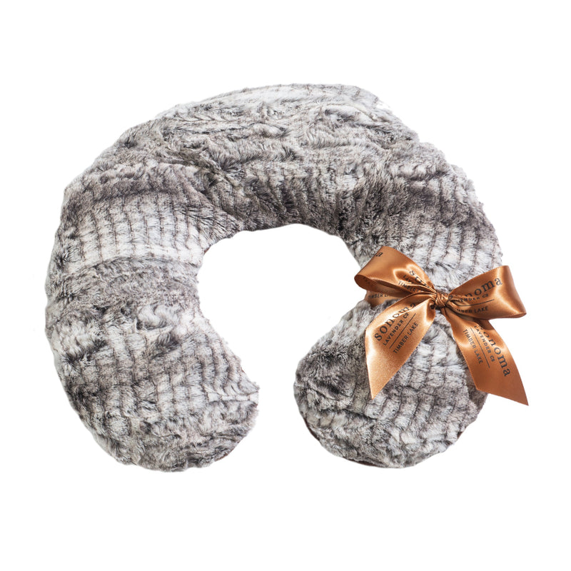 A soft, gray knitted Sonoma Lavender neck pillow adorned with a shiny bronze ribbon tied into a bow and filled with flaxseed for heat therapy, isolated on a white background.