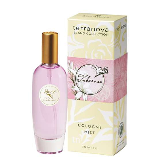 A bottle of Terra Nova Tuberose cologne mist alongside its packaging box, both featuring floral designs and pastel colors. The label on the bottle says "Seductive Tuberose," indicating the fragrance type.
