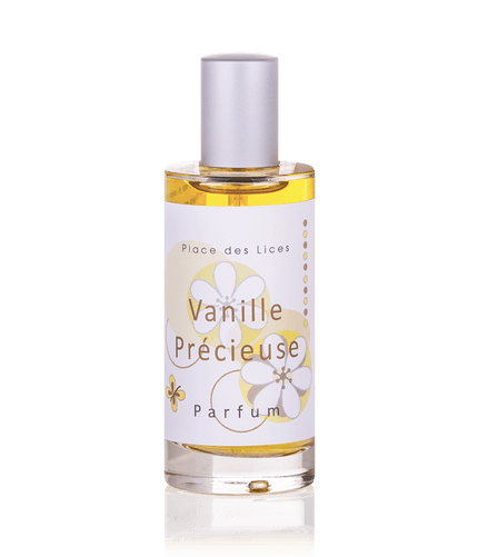 A transparent perfume bottle labeled "Place des Lices Vanille Précieuse Eau de Parfum" with a silvery cap and golden-colored fragrance liquid, standing against a plain background.