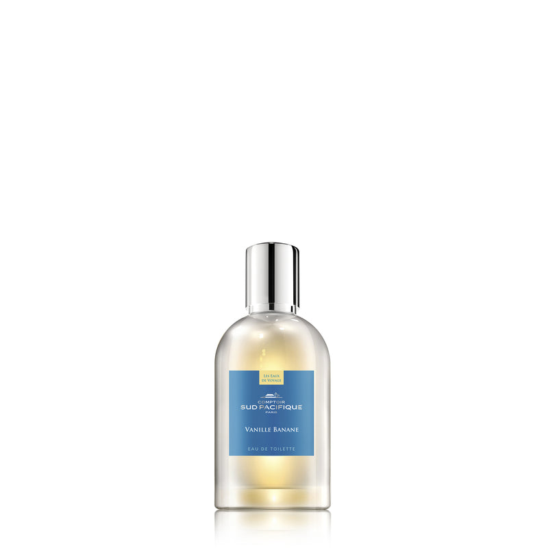 A bottle of Comptoir Sud Pacifique Paris Vanille Banane EDT - 1 fl oz on a white background, featuring a clear design with a silver cap and banana-tinted fragrance.