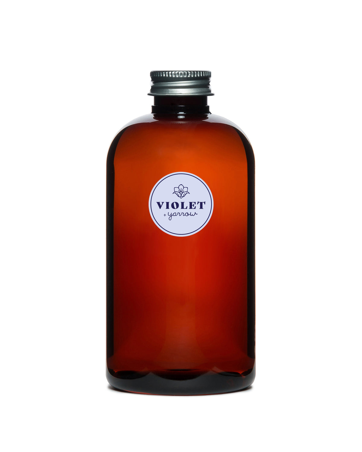Amber glass bottle with a black cap and label reading "U.S. Apothecary Violet + Yarrow Diffuser Oil Refill" in a decorative script, centered on a white and purple U.S. Apothecary logo. The background is white and uniform.