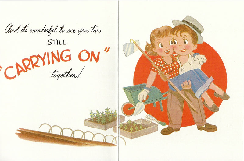 Vintage Anniversary Greeting card by Greeting Cards depicting a joyful couple gardening together; the man is holding a book and a net, while the woman holds a watering can, with the phrase "carrying on" highlighted inside pictured.