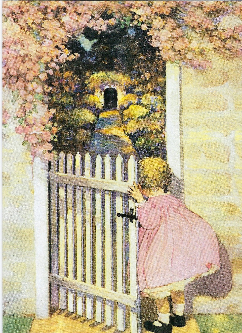 A young child in a pink dress peers curiously through a white picket gate surrounded by lush greenery and flowering vines, with a soft glow emanating from behind the Birthday Greeting Card - You are as young as your dreams by Greeting Cards.