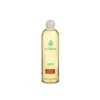 A clear glass bottle of Carthusia Corallium reed diffuser & refill with a pale yellow liquid, featuring elegant white and green labeling.