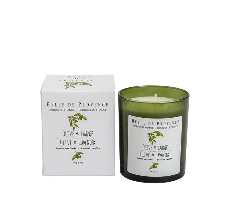 A green Lothantique olive oil & lavender scented candle next to its white packaging box, both labeled "belle de provence" with details in green text indicating the product is from France.