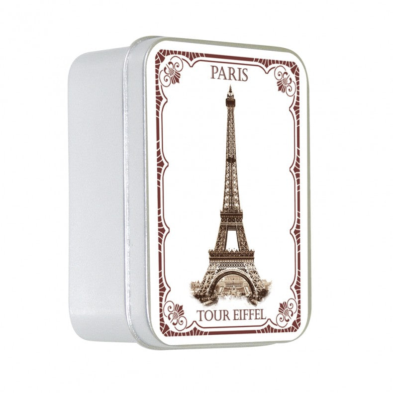 A Le Blanc Made in France decorative tin with a vintage design featuring an illustration of the Eiffel Tower and the words "Paris Tour Eiffel" on the front, with a white background and ornate borders, contains Le Blanc Rose Eiffel Tower 100gm soap.