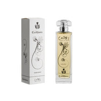 An image of a Carthusia Capri Forget-Me-Not Note room spray by Carthusia I Profumi de Capri next to its packaging. The bottle and box are adorned with elegant black botanical illustrations on a white background.