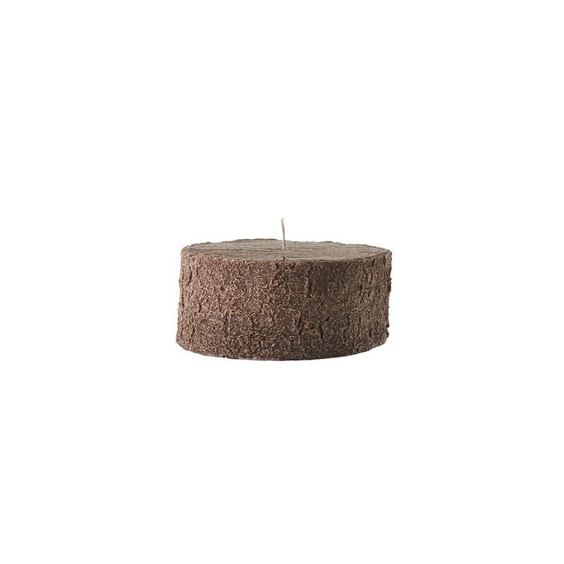 A simple dark wood, round, textured Bougies la Francaise Centerpiece Tree Log Candle with an unlit wick, isolated on a white background.