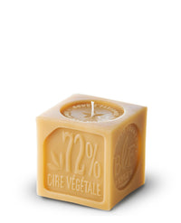 A beige square Bougies la Française Marseille Soap Decorative Candle with "72% cire vegetale" embossed on it, standing against a white background. The wick is visible at the top center.