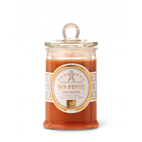 A Bougies La Francaise scented candle in a translucent orange jar with a label that reads "gingerbread" and a decorative lid on a white background.