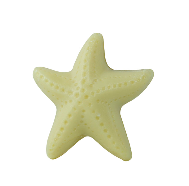 A pale yellow La Lavande Starfish - Grapefruit soap with a slightly textured surface from the La Lavande Ocean Collection, isolated on a white background.